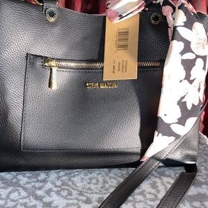 Brand new black Steve Madden purse with cute little scarf bow on the side.
